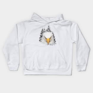 Great bald eagle head in background of snowy pine trees Kids Hoodie